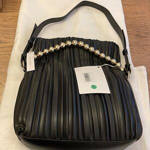 TOPSHOP ELEGANT VEGAN HANDBAG WITH BOLD GOLD DETAIL THAT SWINGS ACROSS B…